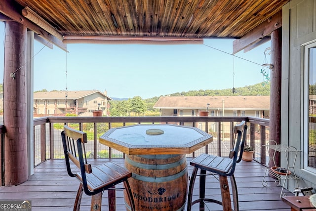 wooden balcony featuring a deck