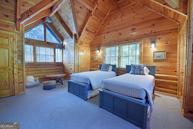 bedroom with high vaulted ceiling, beam ceiling, and multiple windows