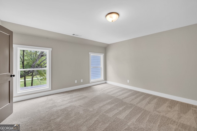 view of carpeted spare room