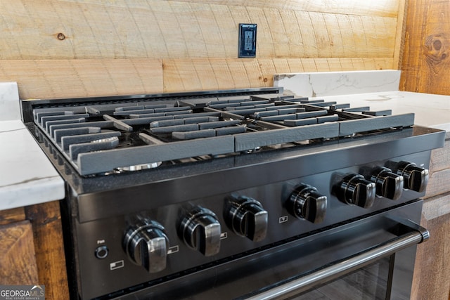 interior details with tasteful backsplash and stainless steel stove