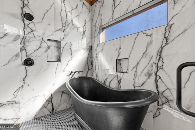 bathroom with a tub