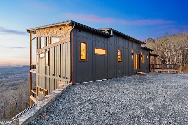 view of property exterior at dusk