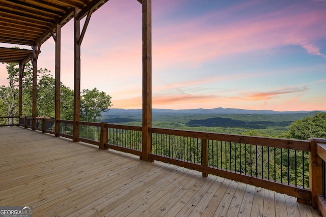 deck at dusk with a mountain view