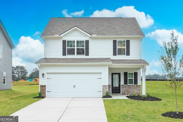 view of front facade featuring a garage and a front yard