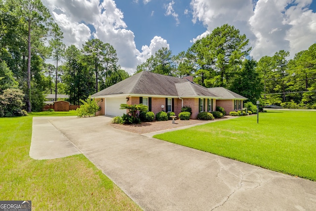 single story home with a front yard and a garage