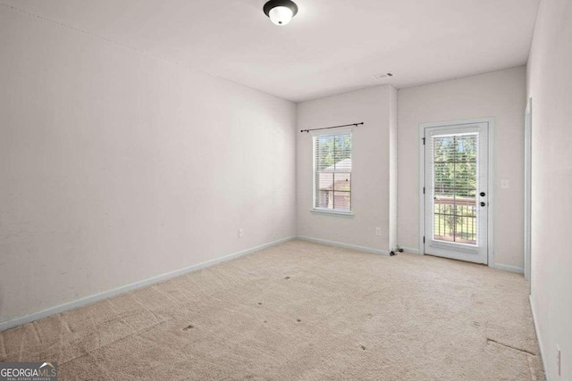 view of carpeted spare room