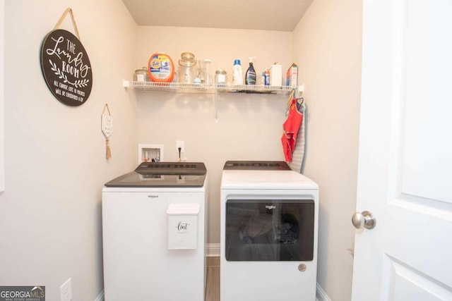 laundry room with washer and clothes dryer