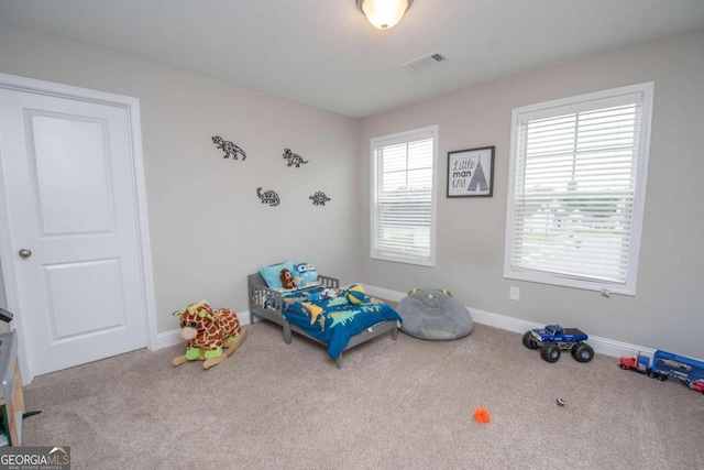 bedroom featuring carpet flooring