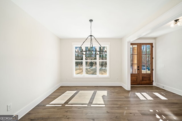 unfurnished living room featuring hardwood / wood-style floors, a stone fireplace, and ceiling fan