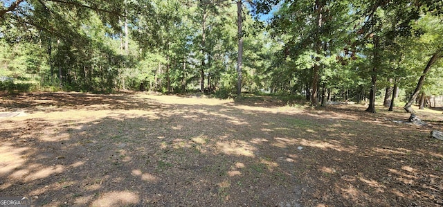 view of nature with a wooded view