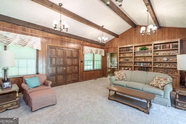 carpeted living room featuring wooden walls, an inviting chandelier, and lofted ceiling with beams