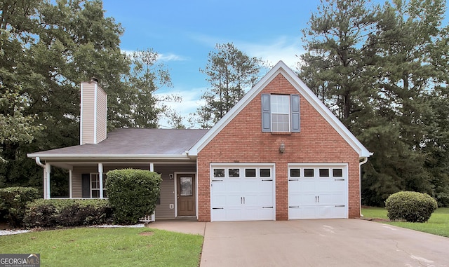 traditional-style home with a front lawn, concrete driveway, a garage, brick siding, and a chimney