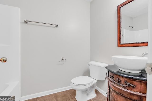 full bathroom featuring tile patterned flooring, toilet, vanity, and shower / tub combination