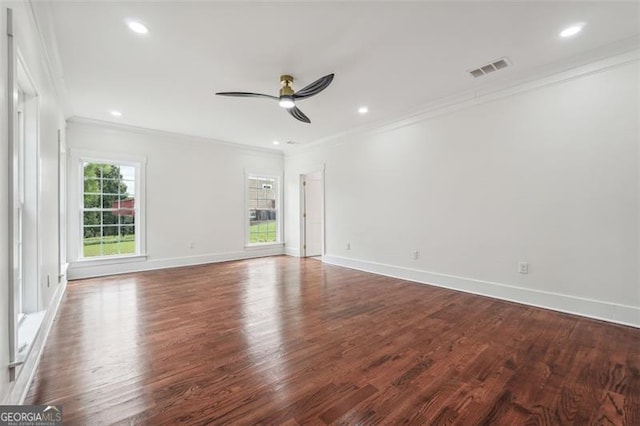 unfurnished room featuring ceiling fan, hardwood / wood-style floors, and ornamental molding