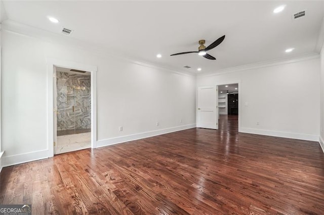 interior space with ceiling fan, connected bathroom, crown molding, and wood-type flooring