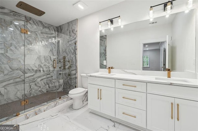 bathroom featuring tile patterned floors, a shower with shower door, vanity, and toilet