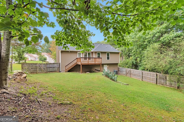 view of yard with a wooden deck