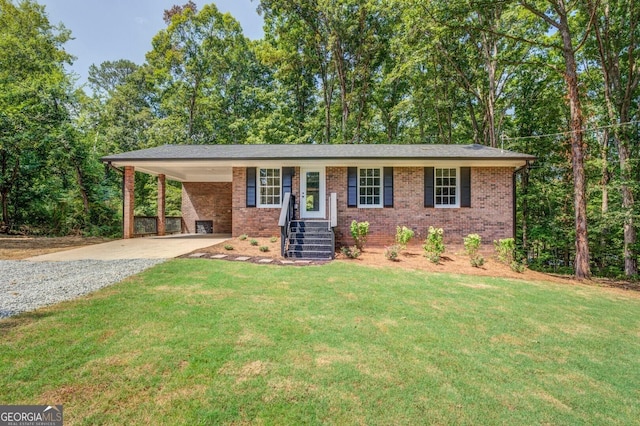 view of front of property with a carport, a front yard, and central AC