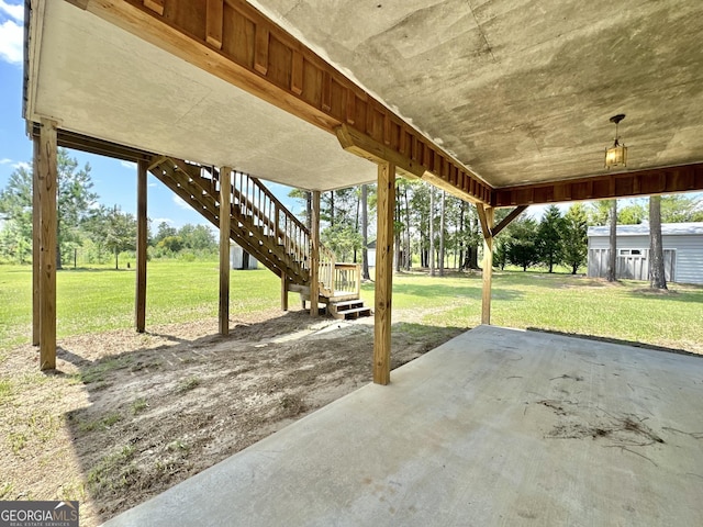 view of patio / terrace featuring stairs