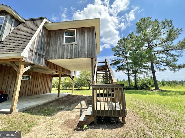 exterior space with a yard