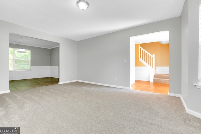 unfurnished room featuring carpet floors