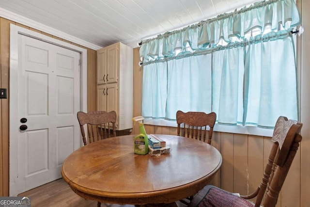 dining area with light hardwood / wood-style floors