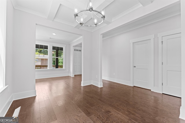 unfurnished living room featuring beamed ceiling, crown molding, wood-type flooring, and an inviting chandelier