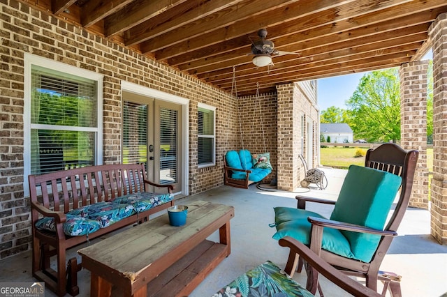 view of patio / terrace featuring ceiling fan