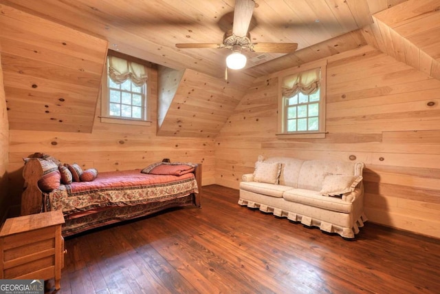 bedroom featuring hardwood / wood-style flooring and multiple windows