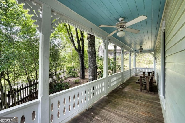 wooden terrace with ceiling fan