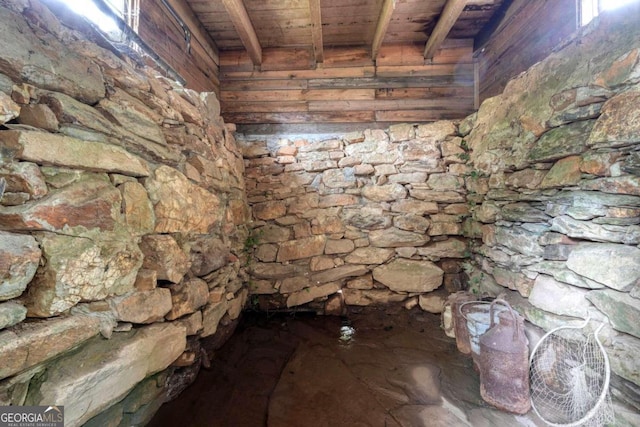 interior space featuring wooden ceiling