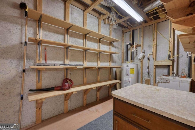 basement featuring a workshop area and water heater