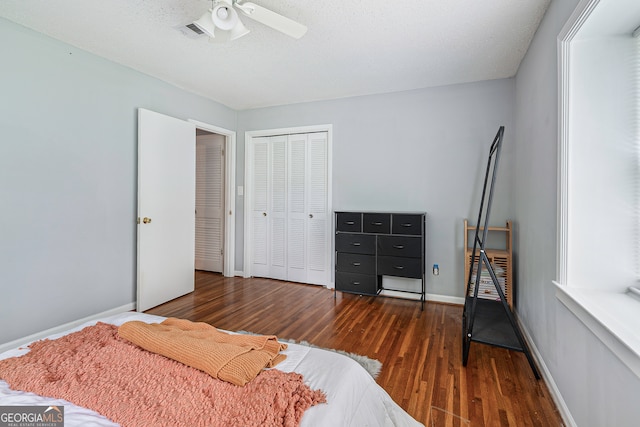 bedroom featuring ceiling fan and hardwood / wood-style flooring