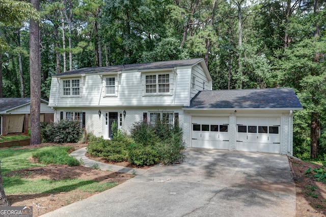 view of front of property with a garage