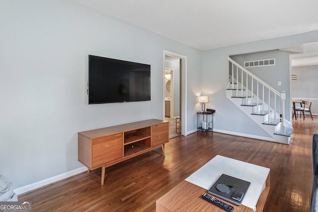 living room with hardwood / wood-style floors