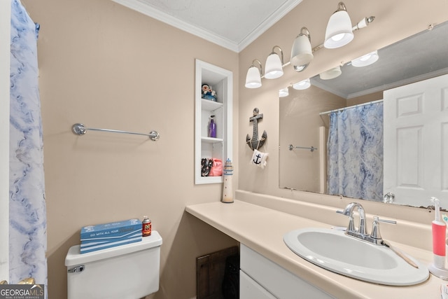 bathroom with vanity, built in features, toilet, and ornamental molding