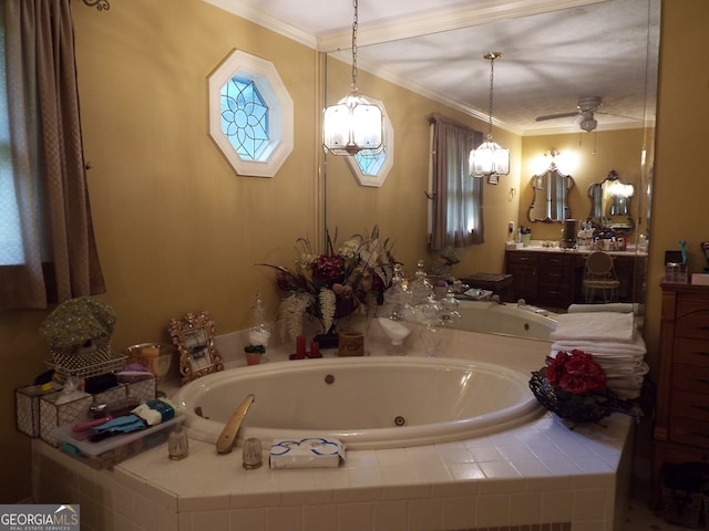 bathroom with vanity, tiled bath, and ornamental molding