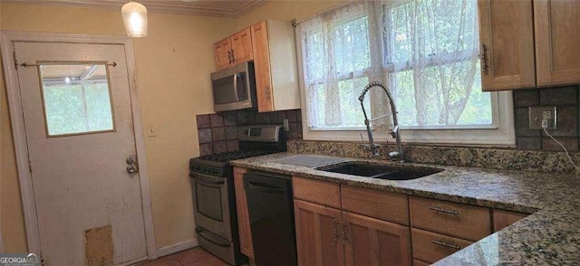 kitchen with decorative backsplash, stone countertops, sink, range with gas cooktop, and black dishwasher