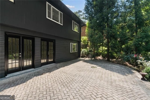 view of patio featuring french doors