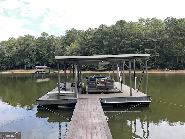 view of dock with a water view