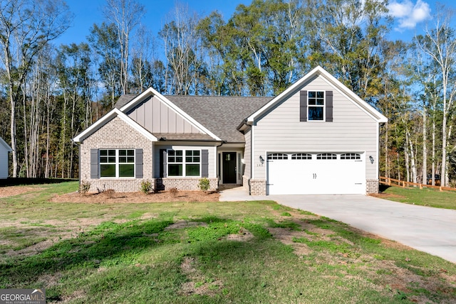 view of front facade with a garage and a front yard