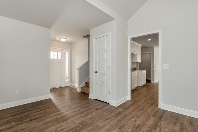 interior space with dark hardwood / wood-style floors