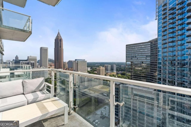 balcony featuring a view of city