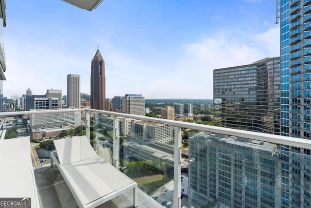 balcony featuring a view of city