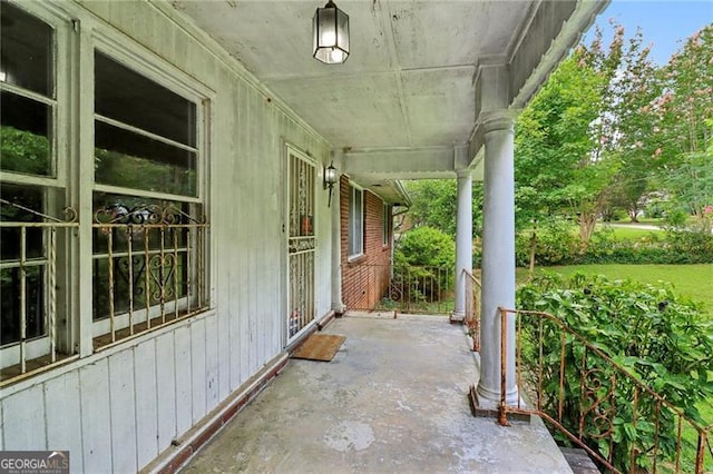 view of patio featuring a porch