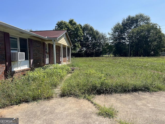 view of yard featuring cooling unit