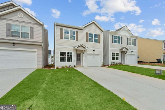 view of front of house with a garage and a front yard