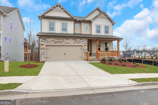 craftsman house featuring a porch, a garage, and a front lawn