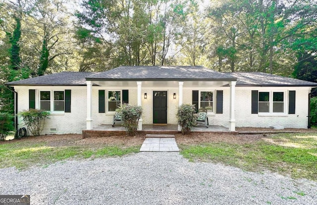 ranch-style house with a porch