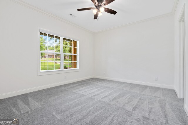 empty room featuring built in shelves and light hardwood / wood-style flooring